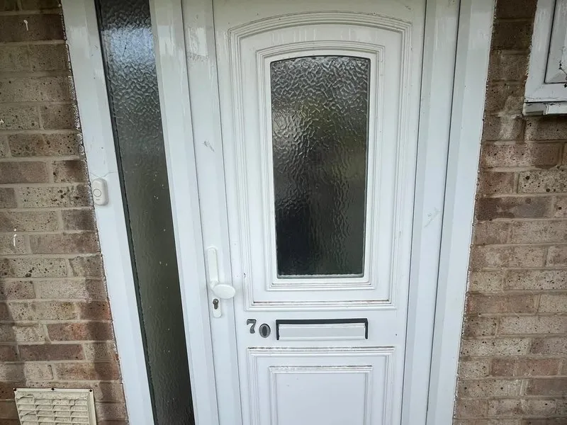 Grubby uPVC front door before cleaning