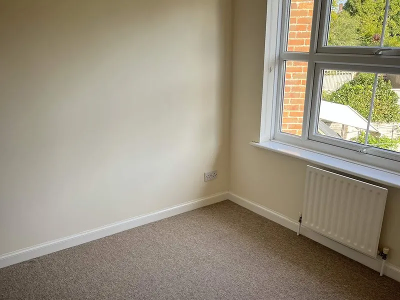 Empty bedroom cleaned and ready for an end of tenancy inspection